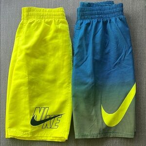 2 Nike Kids Blue and Yellow swim trunks